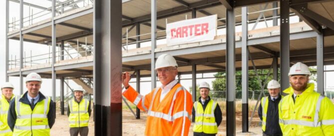Men in hi vis jackets at construction site